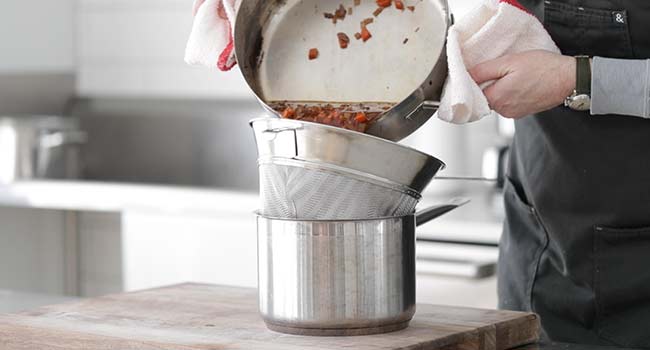 straining a beef stock