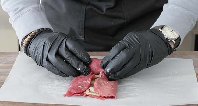 rolling up beef rouladen