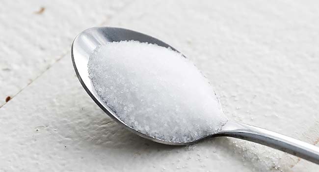 table salt in a spoon