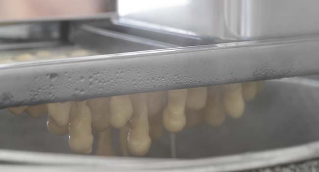 sough going through a spaetzle maker