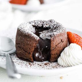 lava cake on a plate with whipped cream
