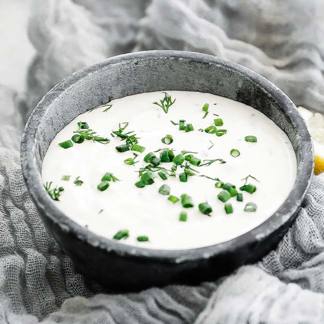 lemon dill sauce in a ramekin