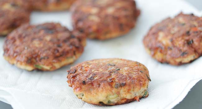 letting fried salmon patties on paper towels