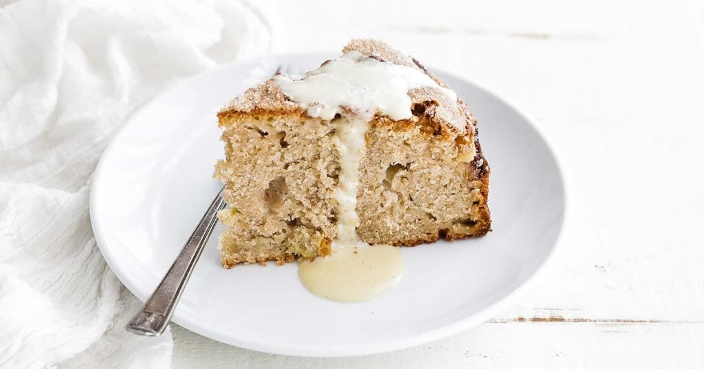 slice of apple Irish cake with custard sauce