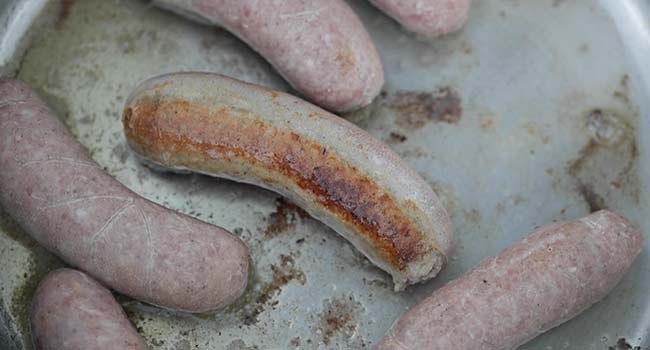 pan searing bangers in a pan