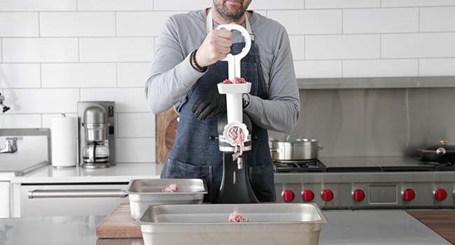 grounding pork through a food grinder