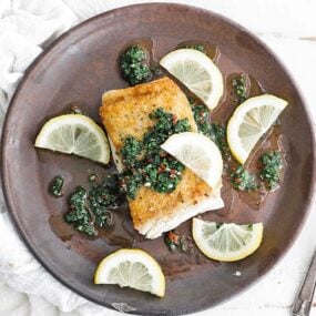 halibut with chimichurri sauce and lemons