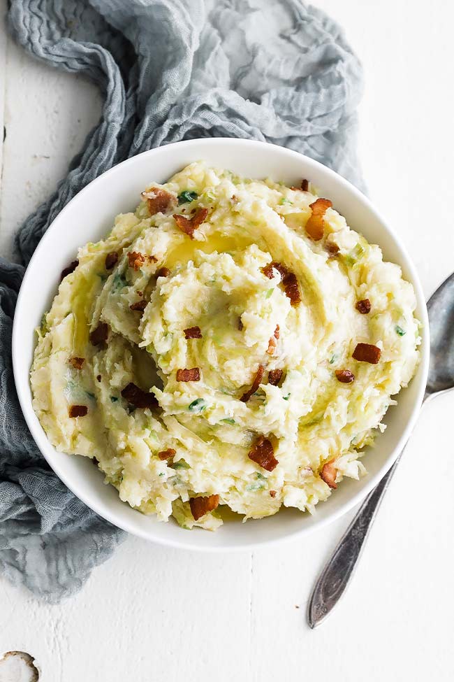 bowl of irish colcannon with bacon and cabbage