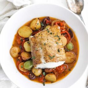 pan seared chilean sea bass on mediterranean style vegetables