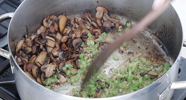 sauteing onions and celery with mushrooms