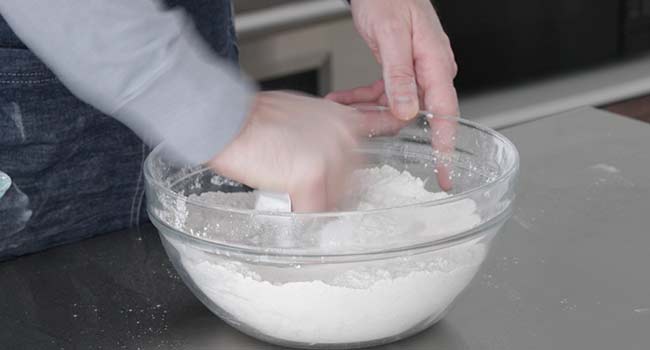 cutting butter into dry ingredients