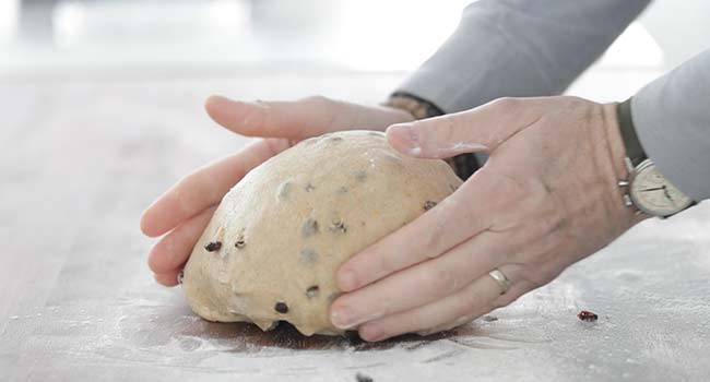 kneading hot cross bun dough