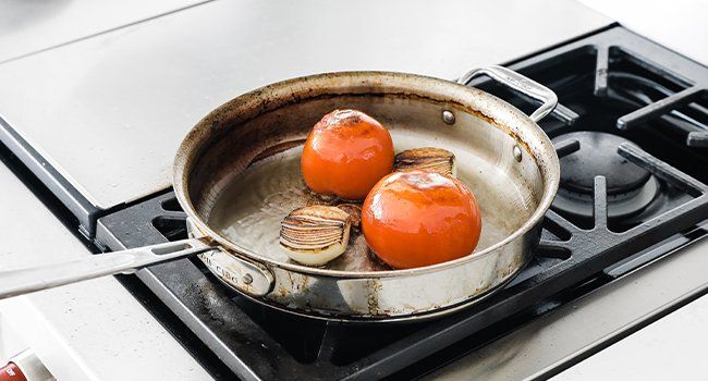 roasting vegetables in a pan