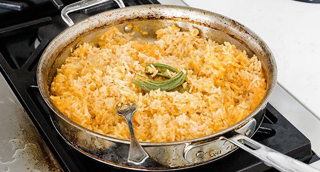 breaking up cooked mexican rice