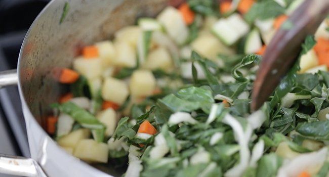 vegetables cooking in a pan