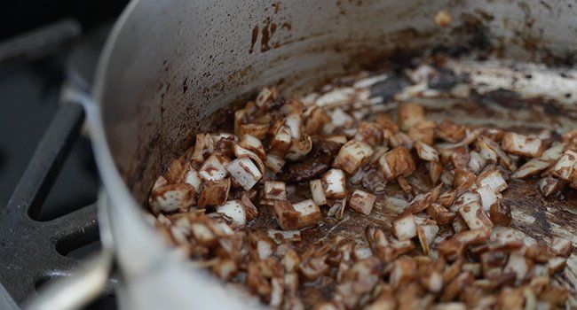 caramelizing onions in a pan