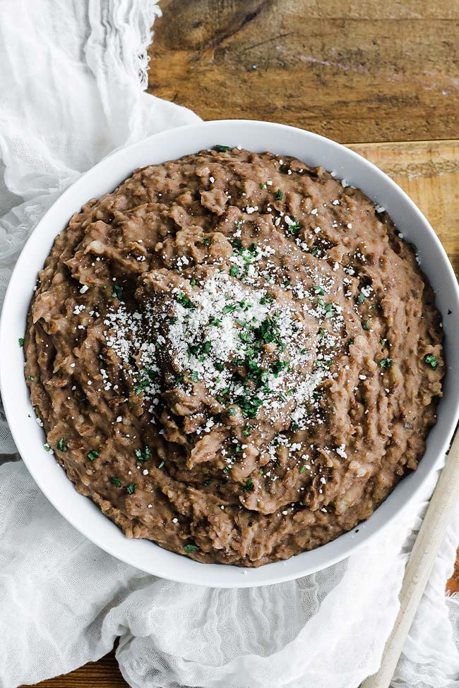 homemade refried beans with cheese and cilantro