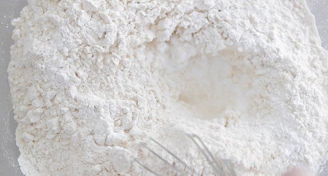 mixing flour and salt