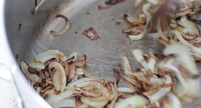 caramelizing onions in a pan