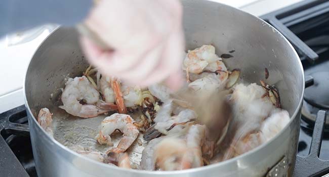 cooking shrimp in a pan