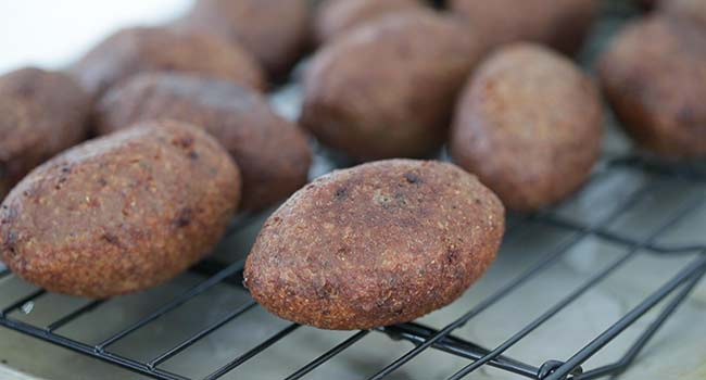 fried kibbeh on a rack