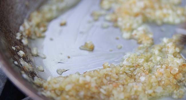 caramelizing onions in a pan