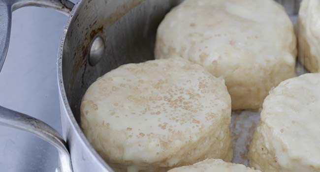 adding sugar to biscuits