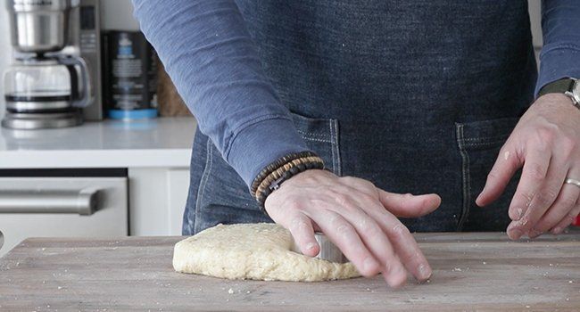 cutting out biscuits from dough