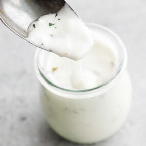 garlic yogurt sauce in a jar