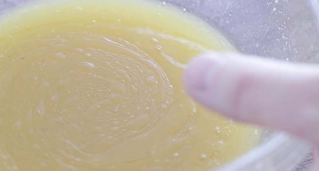 whisking together a vinaigrette