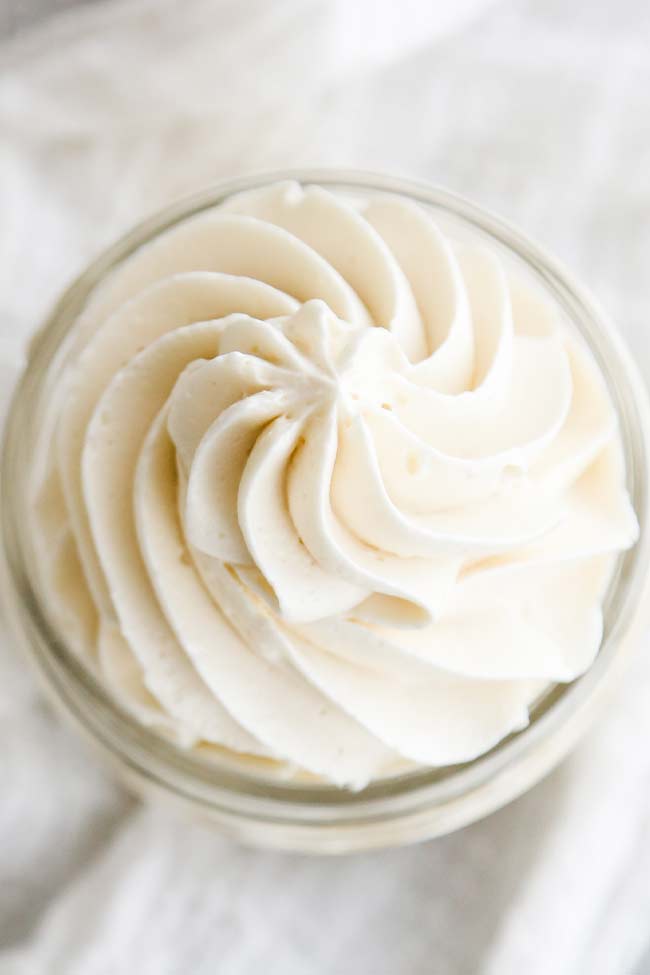 piped buttercream in a jar