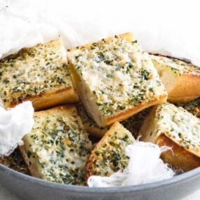 bowl of garlic bread with herbs