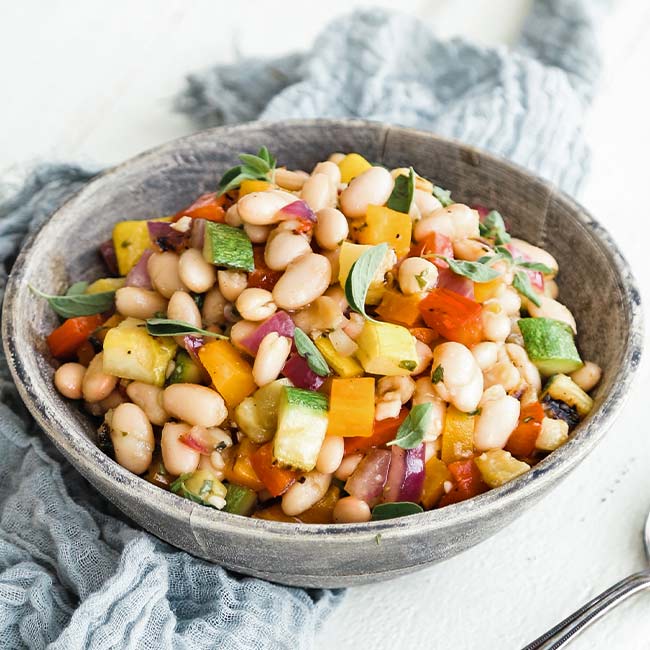 mediterranean bean salad with roasted vegetables and herbs