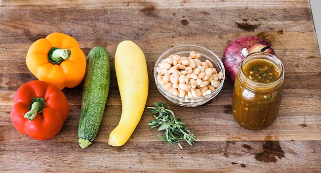 ingredients to make a Mediterranean bean salad