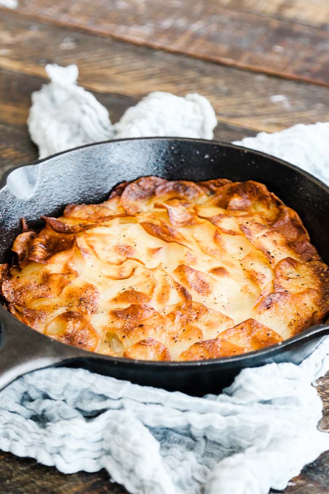 classic potatoes anna in a cast iron skillet