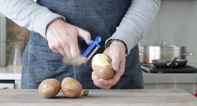 peeling potatoes