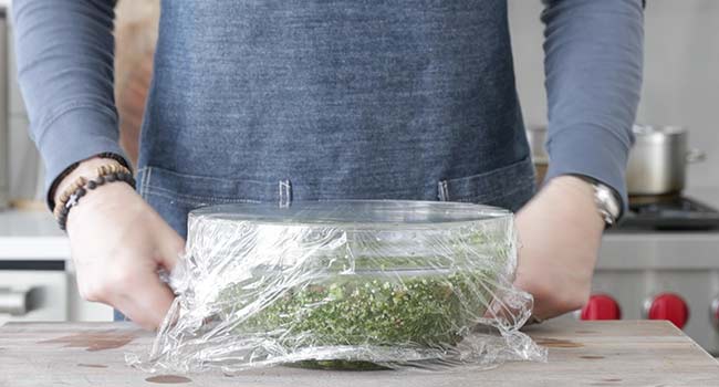 covering a tabbouleh salad