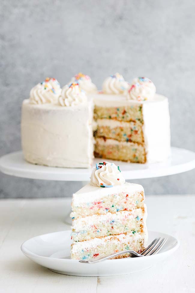 funfetti cake with a slice