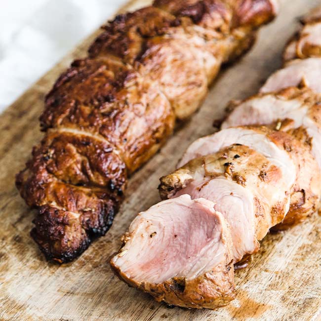 pork tenderloin on a cutting board