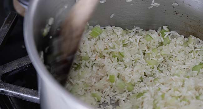 toasting rice in a pan