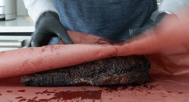 wrapping a brisket in peach paper