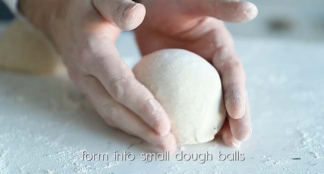 forming a pizza dough ball