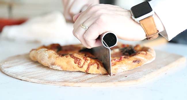 cutting a pizza