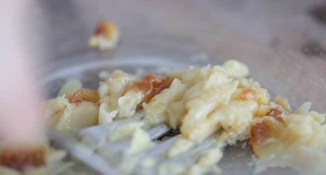 mashing roasted garlic cloves