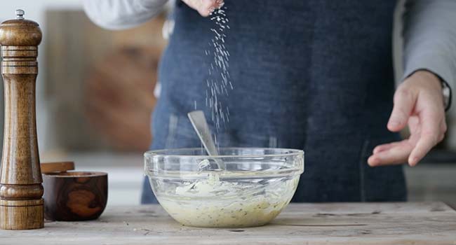 seasoing butter with salt and pepper