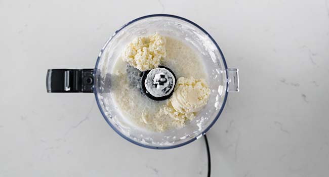 processing heavy cream in a food processor