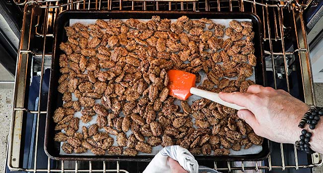 mixing cooked pecans