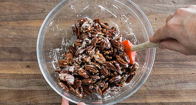 folding pecans into whipped egg whites