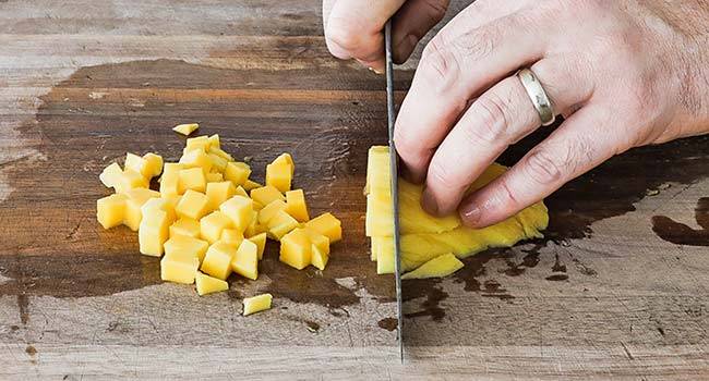 medium dicing a fresh mango