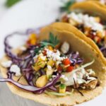 fish taco with salsa and cabbage